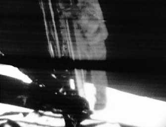 Who filmed Neil Armstrong's first step on the moon?