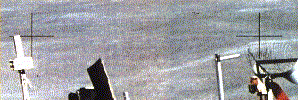 How can the crosshair be BEHIND the image in the photograph?